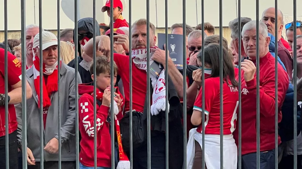 FILE PHOTO: Soccer Football - Champions League Final - Liverpool v Real Madrid - Stade de France, Saint-Denis near Paris, France - May 28, 2022 Liverpool fans react as they queue to access Stade de France before Champions League Final  REUTERS/Fernando Kallas/File Photo
