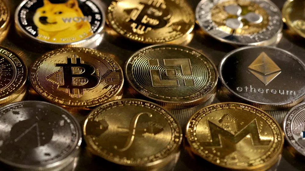 FILE PHOTO: Representations of cryptocurrencies are seen in this illustration, August 10, 2022. REUTERS/Dado Ruvic/Illustration/File Photo/File Photo