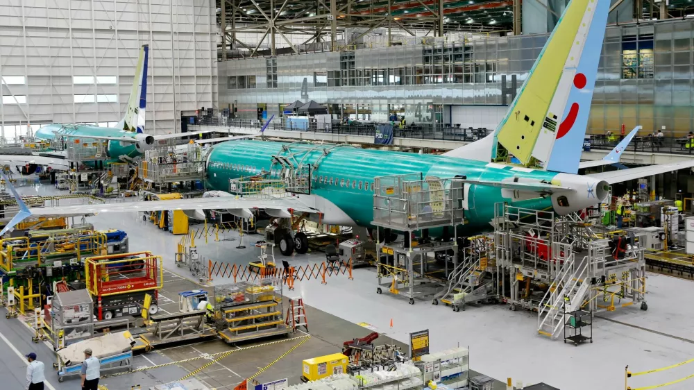 FILE PHOTO: Boeing 737 MAX aircraft are assembled at the company's plant in Renton, Washington, U.S. June 25, 2024. Jennifer Buchanan/Pool via REUTERS/File Photo