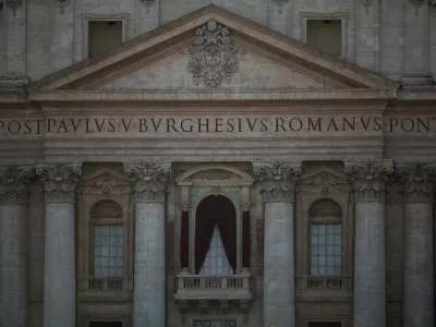 A view shows the central balcony (Loggia delle Benedizioni) of St. Peter's Basilica, after white smoke appeared from the chimney on the Sistine Chapel, indicating that a new pope has been elected, as seen from Rome, Italy May 8, 2025.  REUTERS/Alkis Konstantinidis