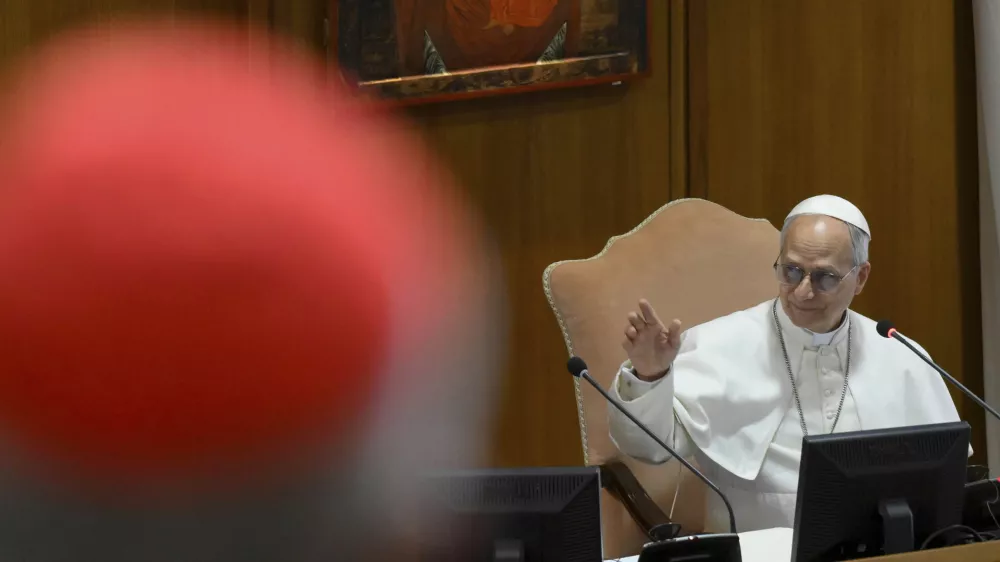 Pope Leo XIV meets the College of Cardinals in the New Synod Hall at the Vatican, Saturday, May 10, 2025. (Vatican Media via AP)