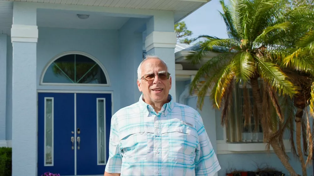 Louis "Lou" Prevost, eldest brother of Pope Leo XIV, poses for a portrait outside his home in Port Charlotte, Florida, U.S., May 9, 2025. REUTERS/Maria Alejandra Cardona