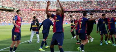 Soccer Football - LaLiga - FC Barcelona v Real Madrid - Estadi Olimpic Lluis Companys, Barcelona, Spain - May 11, 2025 FC Barcelona's Lamine Yamal celebrates after the match with team mates REUTERS/Nacho Doce