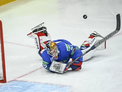 Slovenia's goalkeeper Matija Pintaric in action, during the IIHF Ice Hockey World Championship group A match between Slovakia and Slovenia, at Avicii Arena in Stockholm, Sweden, Sunday, May 11, 2025. (Fredrik Sandberg/TT News Agency via AP)