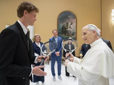 Italy's Jannik Sinner, left, shares a light moment with Pope Leo XIV on the occasion of their meeting at the Vatican, Wednesday, May 14, 2025. (Vatican Media via AP)