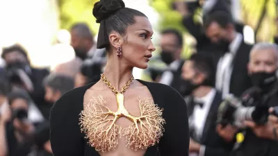 FILE -Bella Hadid poses for photographersat the premiere of 'Three Floors' at the 74th international film festival, Cannes, southern France on July 11, 2021. (AP Photo/Brynn Anderson, File)