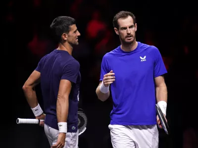 FILED - 22 September 2022, United Kingdom, London: British tennis player Andy Murray (R) speaks with Serbia's Novak Djokovic. Andy Murray's partnership with Novak Djokovic has come to an end after the pair announced they would no longer be working together. Photo: John Walton/PA Wire/dpa