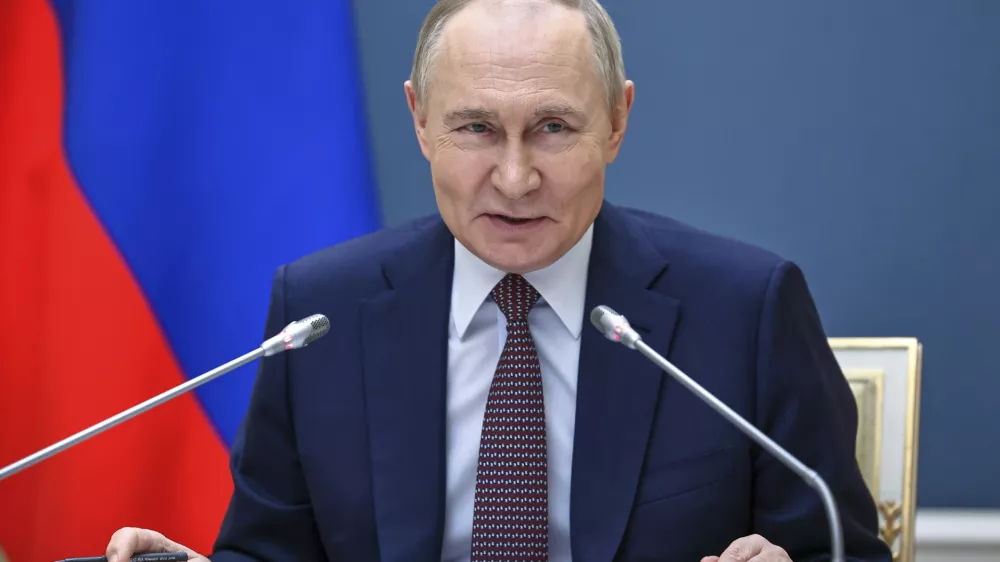 Russian President Vladimir Putin attends a meeting of the All-Russian public organisation "Business Russia", via videoconference at the Kremlin in Moscow, Russia, Tuesday, May 13, 2025. (Alexander Kazakov, Sputnik, Kremlin Pool Photo via AP)
