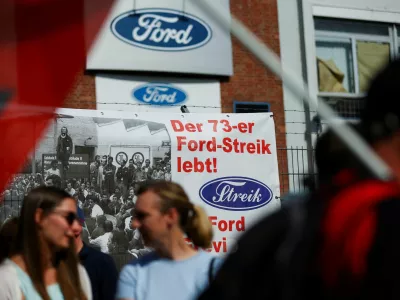 The word "Strike" is displayed in the typography of Ford sign on a banner, as workers rally during a strike by IG Metall union at a Ford plant in Cologne, Germany, May 14, 2025. REUTERS/Thilo Schmuelgen   TPX IMAGES OF THE DAY