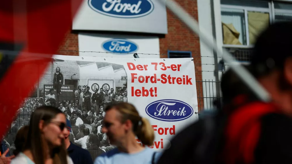 The word "Strike" is displayed in the typography of Ford sign on a banner, as workers rally during a strike by IG Metall union at a Ford plant in Cologne, Germany, May 14, 2025. REUTERS/Thilo Schmuelgen   TPX IMAGES OF THE DAY