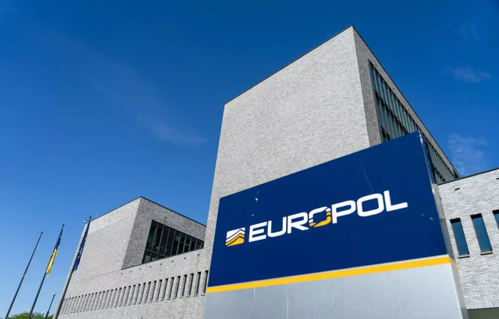FILED - 08 June 2021, Netherlands, Den Haag: The European Union's law enforcement agency (Europol) logo can be seen at it's building in Den Haag. Europol reported that it had broken up 11 gangs and seized goods to the value of almost $100 million in a campaign against counterfeit food and beverages. Photo: Jerry Lampen/anp/dpa