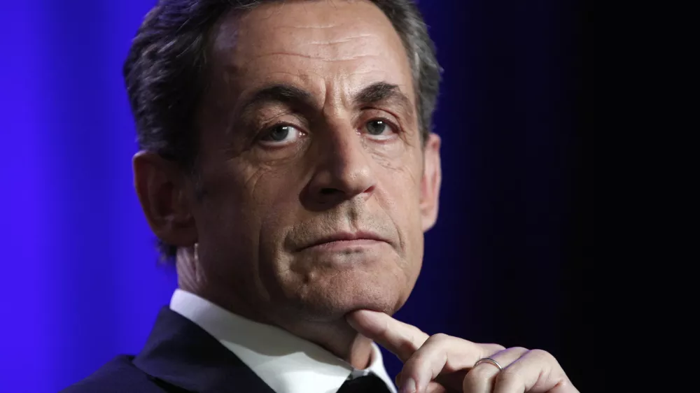FILE - Former French President Nicolas Sarkozy attends a meeting in Asnieres, outside Paris, March 24 2015. (AP Photo/Thibault Camus, File)