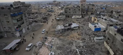 FILE - A tent camp for displaced Palestinians is set up amid destroyed buildings in the Khan Younis refugee camp, southern Gaza Strip, Jan. 4, 2025. (AP Photo/Abdel Kareem Hana, File)