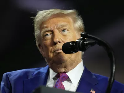 President Donald Trump speaks at the Al Udeid Air Base, Thursday, May 15, 2025, in Doha, Qatar. (AP Photo/Alex Brandon)