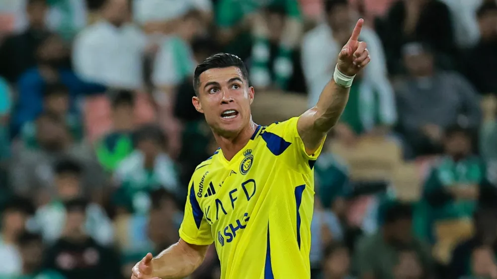 Soccer Football - Saudi Pro League - Al Ahli v Al Nassr - King Abdullah Sports City, Jeddah, Saudi Arabia - February 13, 2025 Al Nassr's Cristiano Ronaldo reacts after being substituted REUTERS/Stringer