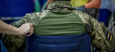 A Ukrainian serviceman, wounded during fighting with Russian forces, who is a patient of the Mechnykov Hospital, prepares for being transferred, amid Russia's attack on Ukraine, in Dnipro, Ukraine, May 14, 2025. REUTERS/Alina Smutko