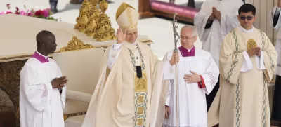 Pope Leo XIV waves at the end of a Mass for the formal inauguration of his pontificate, in St. Peter's Square, at the Vatican, Sunday, May 18, 2025.(AP Photo/Gregorio Borgia)