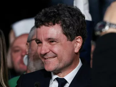 Presidential candidate Nicusor Dan reacts to first exit polls of Romania's second round of the presidential election, in Bucharest, Romania, May 18, 2025. REUTERS/Stoyan Nenov   TPX IMAGES OF THE DAY
