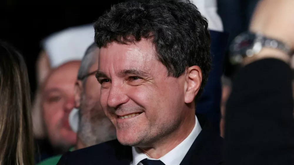 Presidential candidate Nicusor Dan reacts to first exit polls of Romania's second round of the presidential election, in Bucharest, Romania, May 18, 2025. REUTERS/Stoyan Nenov   TPX IMAGES OF THE DAY