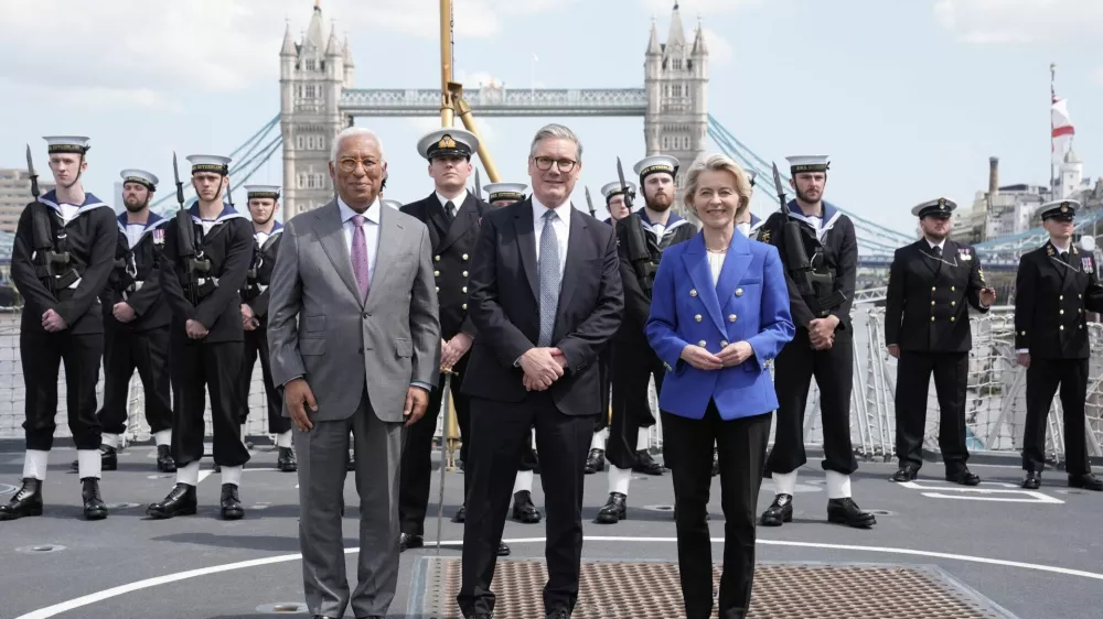 European Council President Antonio Costa, Britain's Prime Minister Keir Starmer and President of the European Commission Ursula von der Leyen stand with members of the Royal Navy on board Type 23 frigate HMS Sutherland in central London, following the UK-EU Summit. Picture date: Monday May 19, 2025. Stefan Rousseau/Pool via REUTERS