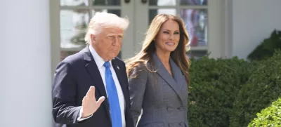 President Donald Trump and first lady Melania Trump arrive in the Rose Garden at the White House, Monday, May 19, 2025 in Washington, where President Trump will sign the "Take It Down Act". (AP Photo/Manuel Balce Ceneta)