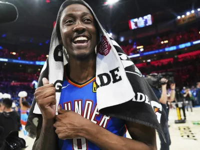 Oklahoma City Thunder's Jalen Williams celebrates as he walks off the court after the team's win against the Denver Nuggets in Game 7 in the Western Conference semifinals of the NBA basketball playoffs, Sunday, May 18, 2025, in Oklahoma City. (AP Photo/Kyle Phillips)