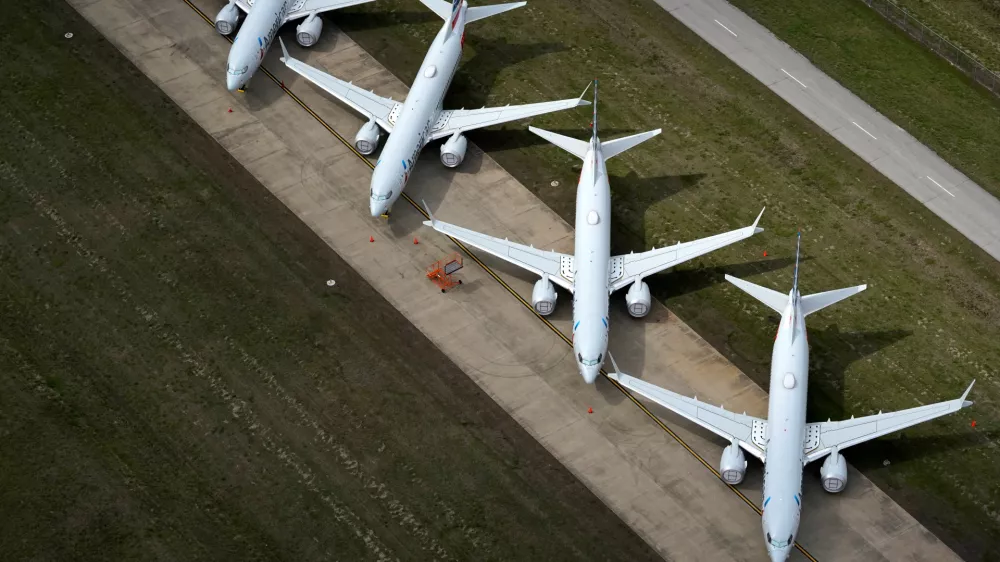 American Airlines 737 max passenger planes are parked on the tarmac at Tulsa International Airport in Tulsa, Oklahoma, U.S. March 23, 2020. REUTERS/Nick Oxford REFILE - CORRECTING PLANE MODEL AND SLUG, REMOVING REFERENCE TO CORONAVIRUS