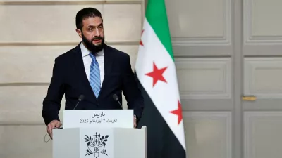 FILE PHOTO: Syrian President Ahmed al-Sharaa speaks during a joint press conference with French President Emmanuel Macron after a meeting at the Elysee Palace in Paris, France, May 7, 2025. REUTERS/Stephanie Lecocq/Pool/File Photo