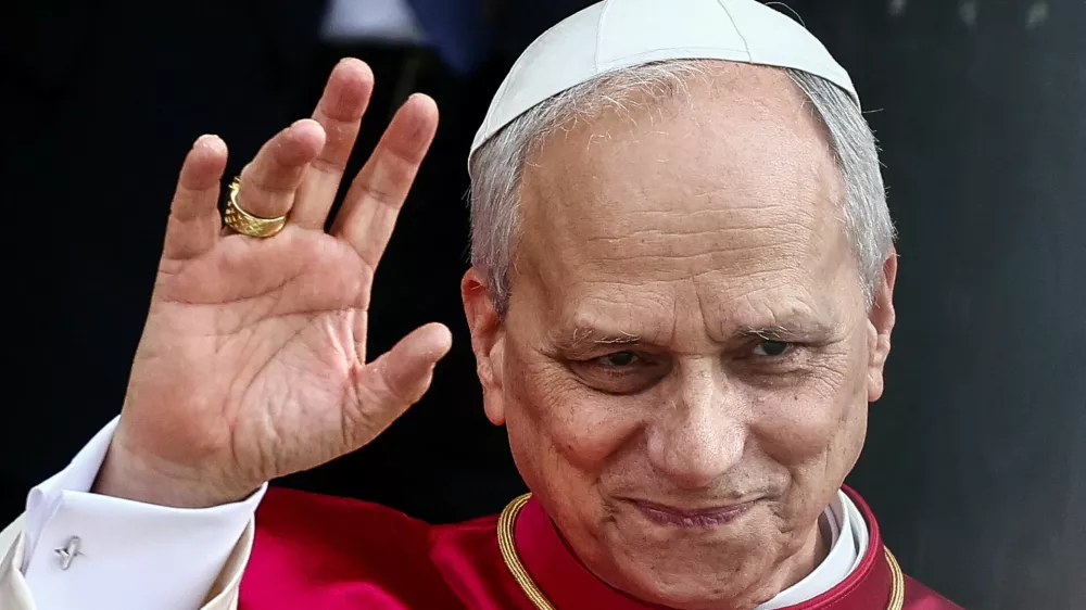 Pope Leo XIV waves as he leaves the basilica of Saint Paul Outside the Walls, in Rome, Italy, May 20, 2025. REUTERS/Yara Nardi