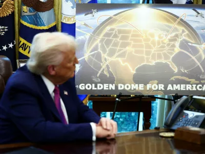 U.S. President Donald Trump looks on as he makes an announcement regarding the Golden Dome missile defense shield with U.S. Defense Secretary Pete Hegseth (not pictured) in the Oval Office of the White House in Washington, D.C., U.S., May 20, 2025. REUTERS/Kevin Lamarque