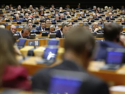 Members of European Parliament listen to a speech by Slovenia's President Natasa Pirc Musar during a plenary session at the European Parliament building in Brussels, Wednesday, May 21, 2025. (AP Photo/Geert Vanden Wijngaert)