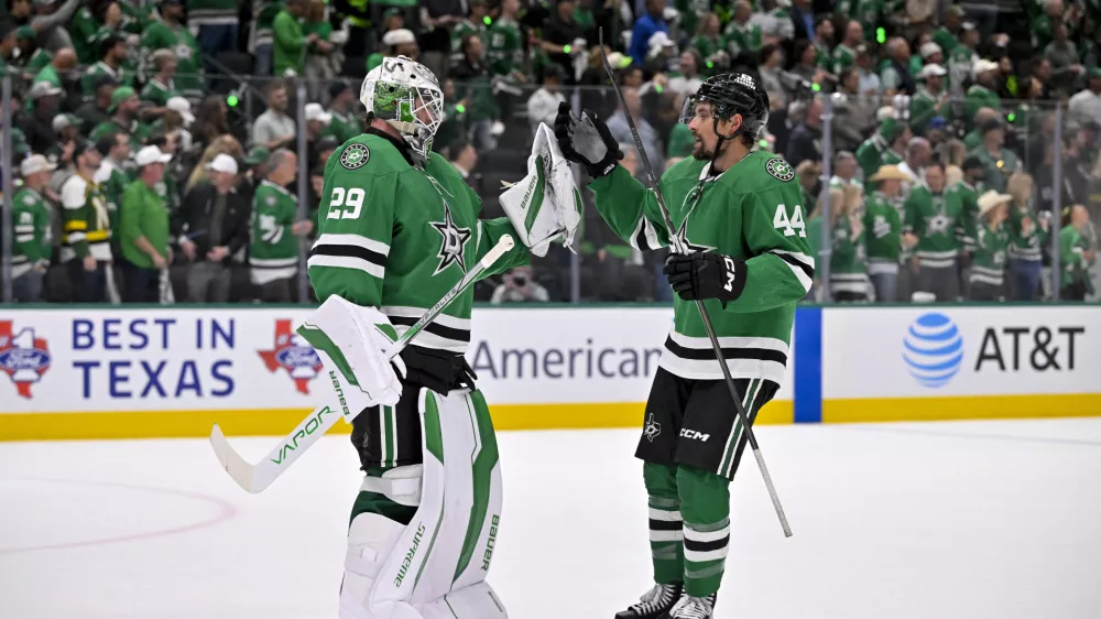 May 21, 2025; Dallas, Texas, USA; Dallas Stars goaltender Jake Oettinger (29) and defenseman Cody Ceci (44) celebrate after the Stars defeat the Edmonton Oilers in game one of the Western Conference Final of the 2025 Stanley Cup Playoffs at American Airlines Center. Mandatory Credit: Jerome Miron-Imagn Images