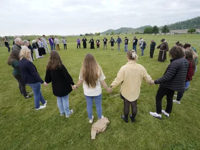 FILE - Capital punishment protesters pray on the grounds of Riverbend Maximum Security Institution before the scheduled execution of inmate Oscar Smith, April 21, 2022, in Nashville, Tenn. AP Photo/Mark Humphrey, File)
