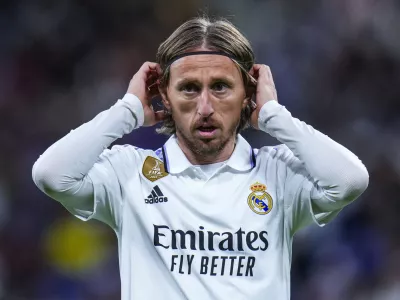 FILE - Real Madrid's Luka Modric gestures during Spanish La Liga soccer match between Real Madrid and Celta Vigo at the Santiago Bernabeu stadium in Madrid, Spain, Saturday, April 22, 2023. Real Madrid midfielder Luka Modric has injured his left thigh barely a week ahead of the Copa del Rey final and the Champions League semifinals, the Spanish club said Friday, April 28, 2023. (AP Photo/Manu Fernandez, File)