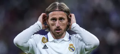FILE - Real Madrid's Luka Modric gestures during Spanish La Liga soccer match between Real Madrid and Celta Vigo at the Santiago Bernabeu stadium in Madrid, Spain, Saturday, April 22, 2023. Real Madrid midfielder Luka Modric has injured his left thigh barely a week ahead of the Copa del Rey final and the Champions League semifinals, the Spanish club said Friday, April 28, 2023. (AP Photo/Manu Fernandez, File)