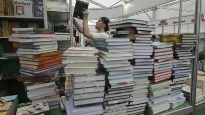 Books are displayed on the eve of the opening of an annual book festival dedicated this year to the 80th anniversary of the Soviet Union's victory over Nazi Germany during the World War II, in St. Petersburg, Russia, Wednesday, May 21, 2025. (AP Photo/Dmitri Lovetsky)