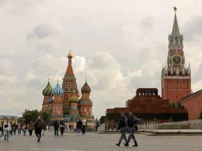 FILE PHOTO: People walk across Red Square near St. Basil's Cathedral and the Kremlin's Spasskaya Tower in central Moscow, Russia September 21, 2022. REUTERS/Evgenia Novozhenina/File Photo