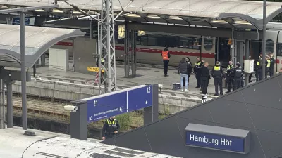 Police at the scene of a stabbing at Hamburg Central Station in Hamburg, Germany, Friday, May 23, 2025. (Steven Hutchings/dpa via AP)