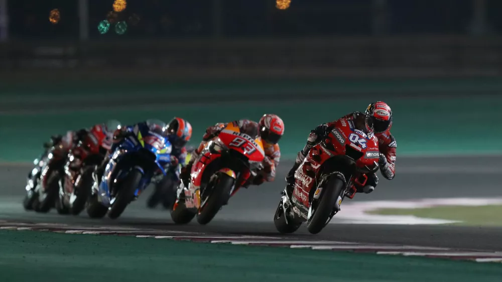 MotoGP - Qatar Grand Prix - Losail International Circuit, Lusail, Qatar - March 10, 2019  Mission Winnow Ducati's Andrea Dovizioso, Repsol Honda Team's Marc Marquez and Team SUZUKI ECSTAR's Alex Rins during the race  REUTERS/Ibraheem Al Omari
