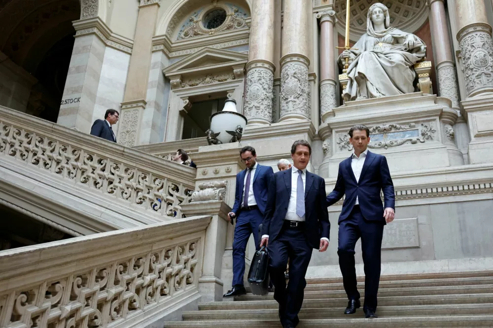 Former Austrian Chancellor Sebastian Kurz walks after the verdict where the court heard Kurz's appeal against perjury conviction in Vienna, Austria, May 26, 2025. REUTERS/Lisa Leutner