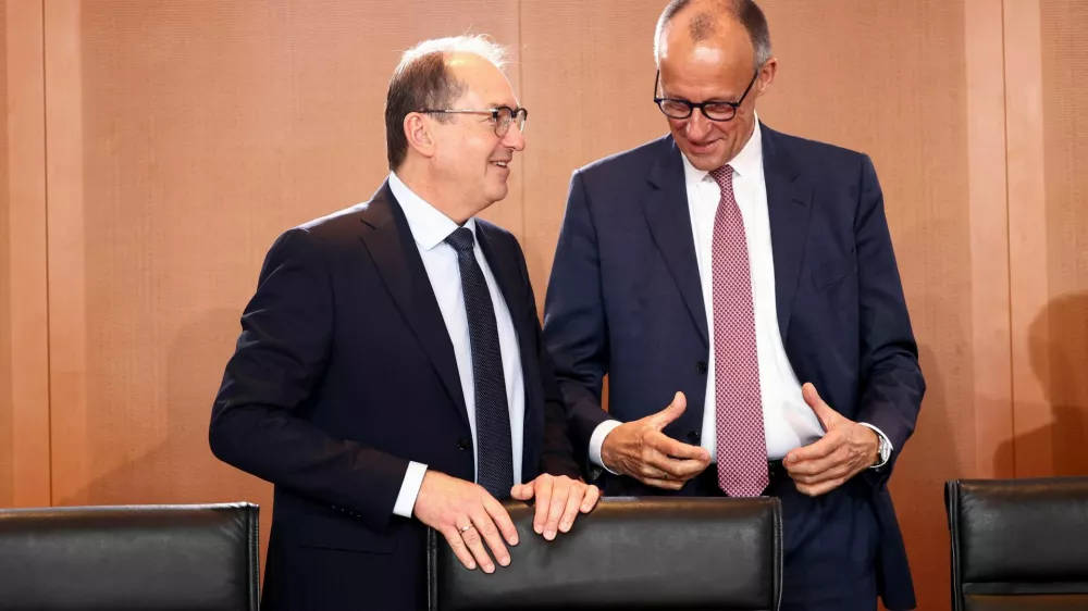 German Interior Minister Alexander Dobrindt and German Chancellor Friedrich Merz attend a cabinet meeting at the Chancellery in Berlin, Germany May 28, 2025.  REUTERS/Liesa Johannssen