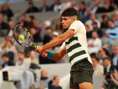 Tennis - French Open - Roland Garros, Paris, France - May 28, 2025 Spain's Carlos Alcaraz in action during his second round match against Hungary's Fabian Marozsan REUTERS/Denis Balibouse