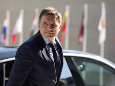 FILE- In this Friday, Sept. 11, 2015 file photo, Slovakian Finance Minister Peter Kazimir arrives for a meeting of EU finance ministers at the European Council building in Luxembourg. The finance ministers from Portugal, Luxembourg, Slovakia and Latvia are in the runoff to seek the presidency of the eurogroup, the gathering of finance chiefs of the 19 nations that use the euro. (AP Photo/Virginia Mayo, File)