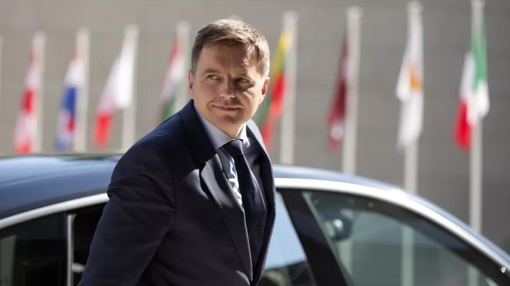 FILE- In this Friday, Sept. 11, 2015 file photo, Slovakian Finance Minister Peter Kazimir arrives for a meeting of EU finance ministers at the European Council building in Luxembourg. The finance ministers from Portugal, Luxembourg, Slovakia and Latvia are in the runoff to seek the presidency of the eurogroup, the gathering of finance chiefs of the 19 nations that use the euro. (AP Photo/Virginia Mayo, File)