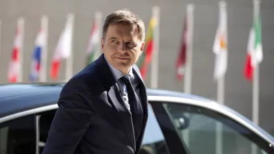 FILE- In this Friday, Sept. 11, 2015 file photo, Slovakian Finance Minister Peter Kazimir arrives for a meeting of EU finance ministers at the European Council building in Luxembourg. The finance ministers from Portugal, Luxembourg, Slovakia and Latvia are in the runoff to seek the presidency of the eurogroup, the gathering of finance chiefs of the 19 nations that use the euro. (AP Photo/Virginia Mayo, File)