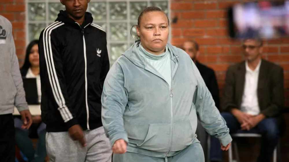 Kelly Smith, the mother of Joshlin Smith, arrives for the sentencing hearing at the Western Cape High Court in Saldanha Bay, South Africa, May 29, 2025. A South African judge sentenced Smith and her two accomplices after they were found guilty of kidnapping and trafficking Smith's six-year-old daughter, Joshlin Smith. REUTERS/Sumaya Hisham