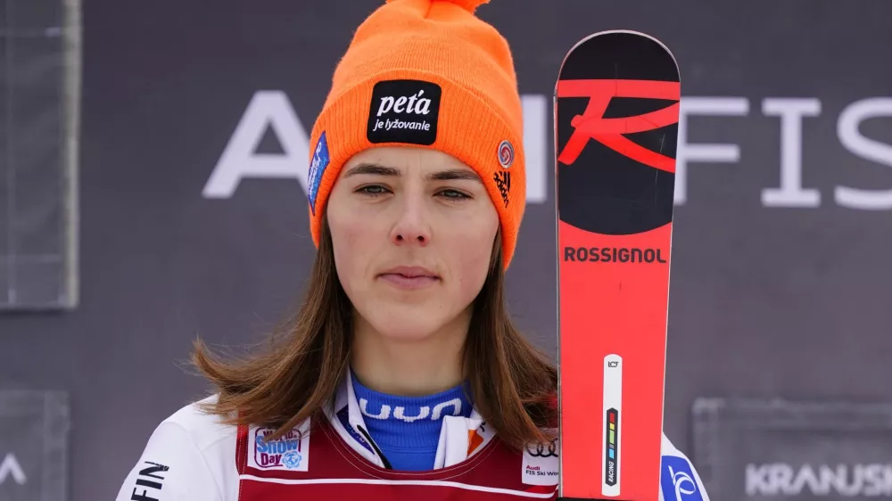 Slovakia's Petra Vlhova stands on the podium after winning the alpine ski, World Cup women's slalom in Kranjska Gora, Slovenia, Sunday, Jan. 9, 2022. (AP Photo/Pier Marco Tacca)