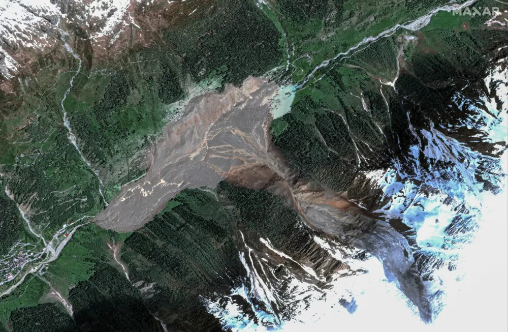 A satellite image shows Blatten after a glacier in the Swiss Alps partially collapsed and tumbled onto the village, in Blatten, Switzerland May 29, 2025. Maxar Technologies/Handout via REUTERS THIS IMAGE HAS BEEN SUPPLIED BY A THIRD PARTY. NO RESALES. NO ARCHIVES. MANDATORY CREDIT. MUST NOT OBSCURE LOGO.