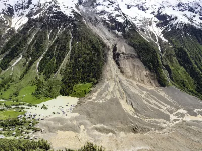 An aerial view shows the destruction of Blatten, Switzerland, Thursday, May 29, 2025, one day after a massive debris avalanche, triggered by the collapse of the Birch Glacier, swept down to the valley floor and demolished large parts of the village. (Jean-Christophe Bott/Keystone via AP)
