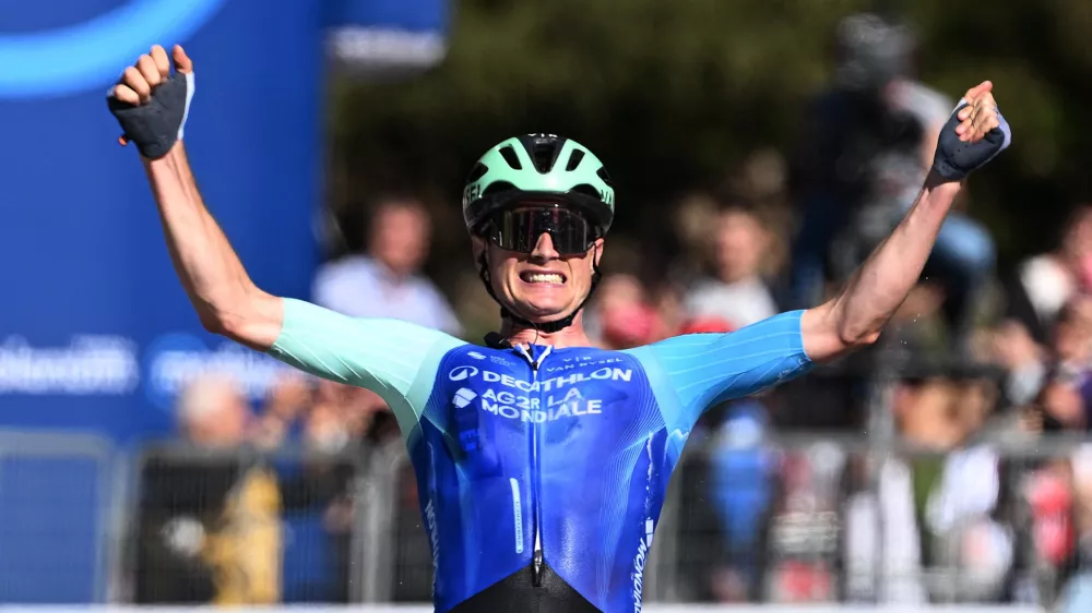 Cycling - Giro d'Italia - Stage 19 - Biella to Champoluc - Italy - May 30, 2025 Decathlon AG2R La Mondiale Team's Nicolas Prodhomme celebrates as he crosses the finish line to win stage 19 REUTERS/Jennifer Lorenzini